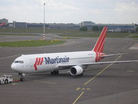 PH-MCM @ EHAM - Schiphol , push back Martinair - by Henk Geerlings
