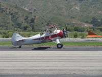 N32135 @ SZP - 1941 Waco UPF-7, Continental W670 220 Hp, a stunning showplane, landing roll Rwy 22 - by Doug Robertson
