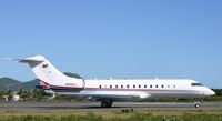 N305CC @ TNCM - taxing runway 10