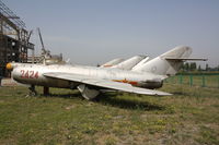 2424 - Shenyang J-5   Located at Datangshan, China - by Mark Pasqualino