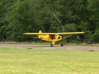 N1939C @ OH36 - Landing on 3 at Zanesville Riverside with a wide-eyed Young Eagle passenger.
