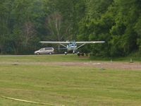 N4734X @ OH36 - Nicely dropped in behind the trees for an on-the-numbers landing on 3 at Zanesville Riverside. - by Bob Simmermon