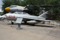 2216 - MiG-15UTI  Located at Datangshan, China - by Mark Pasqualino