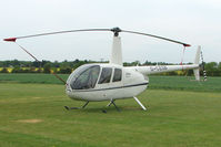 G-CESB @ EGSF - Robinson R44 At Conington in May 2009 - by Terry Fletcher