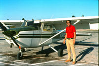 N9958V - Fellow Pilot preflighting 9958V - by Jack Williams