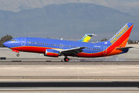 N664WN @ LAS - Southwest Airlines N664WN (FLT SWA2304) from Phoenix Sky Harbor Int'l (KPHX) landing on RWY 25R.