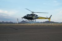 N215TV @ DVT - Landing on west pad. - by Jarrett Friend