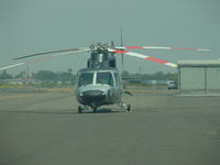 N323CH @ POC - Parked and waiting for patient - by Helicopterfriend