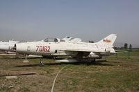 70162 - Chengdu J-7  Located at Datangshan, China - by Mark Pasqualino