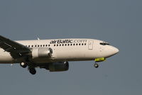 YL-BBR @ EBBR - flight BT601 is descending to rwy 02 - by Daniel Vanderauwera