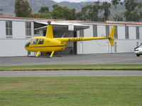 N7523T @ SZP - 2004 Robinson R-44 RAVEN II, Lycoming IO-540 derated to 245 Hp for 5 minutes, 205 Hp continuous, settling to land - by Doug Robertson