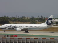 N793AS @ LAX - Rolling on take off from Runway 24L - by Helicopterfriend