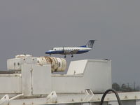 N579SW @ LAX - Inbound for Runway 24R shot over Gate 13 passenger walkway machinery - by Helicopterfriend