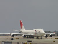 JA8919 @ LAX - Taxiing to Runway 24L - by Helicopterfriend
