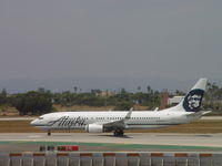 N588AS @ LAX - Rolling westbound for take off on 24L - by Helicopterfriend