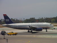N824AW @ LAX - Taxiing to 24L - by Helicopterfriend