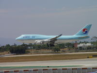 HL7473 @ LAX - Landing on 24R after Singapore Airline 747 departed on 24L - by Helicopterfriend