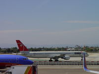 N588NW @ LAX - Taxiing onto 24L ready for take off - by Helicopterfriend