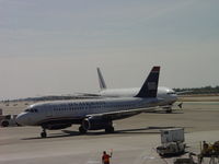 N835AW @ LAX - Taxiing into the gate for unloading at Terminal 1 - by Helicopterfriend