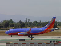 N737JW @ LAX - Taking off westbound on 24L - by Helicopterfriend