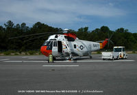 148045 @ NHK - One of 3 remaining Sea Kings in USN at Pax River - by J.G. Handelman