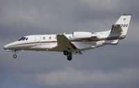 N672QS @ KSAT - One of those numerous NetJets Citations, on short final rwy 3. - by Philippe Bleus