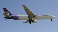 N581HA @ KLAX - Landing 24R at LAX - by Todd Royer