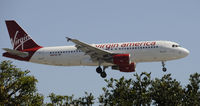 N621VA @ KLAX - Landing 24L at LAX - by Todd Royer