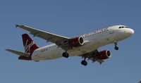 N622VA @ KLAX - Landing 24R at LAX - by Todd Royer