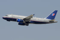 N832UA @ KLAX - Departing LAX on 25R - by Todd Royer