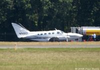 N99EF @ HEF - Across the field, fueling up - by Paul Perry
