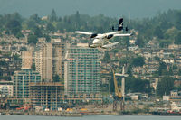 C-GJAW @ CYHC - landing at Coal Harbour,Vancouver BC
