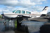 G-BTZA @ EGPT - Beech F33A gets a good clean at Perth Airport in Scotland