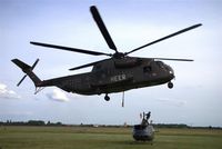 84 50 @ EDAD - CH 53 transport heli of german Bundeswehr is going to lift a demaged Huey - by Holger Zengler