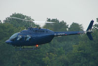 G-OCFD - One of the helicopters at Epsom on 2009 Derby Day - by Terry Fletcher