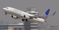 N37274 @ KLAX - Departing LAX on 25R - by Todd Royer