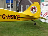 G-HSKE @ EGTB - Tail logo on Husky exhibited at 2009 AeroExpo at Wycombe Air Park - by Terry Fletcher