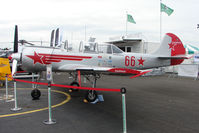 G-YAKN @ EGTB - Red 66 , Yak 52 , exhibited at 2009 AeroExpo at Wycombe Air Park - by Terry Fletcher