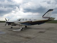 N924BB @ KAXN - As the rain begins to fall... - by Kreg Anderson
