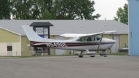 N5496E @ KAXN - Taxiing to a hangar - by Kreg Anderson