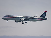 N190UW @ KSFO - On final for one of the 28's. 500 mm ! - by Philippe Bleus