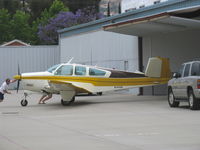 N7848R @ SZP - 1968 Beech V35A BONANZA, Continental IO-550 300 Hp upgrade, push into hangar - by Doug Robertson