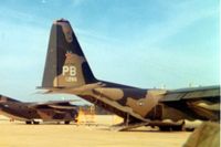 70-1266 @ POB - Cropped from a 3 square photo which was centered on the C-123, 54-0700.  Was riding truck to another C-130 to jump. - by Glenn E. Chatfield