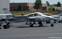 N310GR @ JYO - Quite a wide variety on the ramp here - by Paul Perry