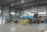 C-FLXT @ CYQF - Air Spray Lockheed Electra - by Yakfreak - VAP