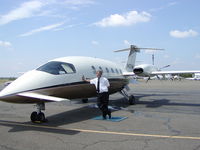 N109MS - Russell in fron of his office - by Brenda Gehrke