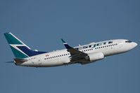 C-FCWJ @ CYEG - Westjet Boeing 737-700