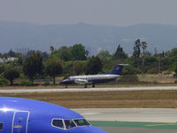 N393SW @ LAX - Taking off westbound on 24R - by Helicopterfriend