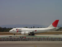 JA8919 @ LAX - Rolling westbound 24L for take off - by Helicopterfriend