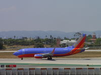 N359SW @ LAX - Starting take off westbound on 24L - by Helicopterfriend